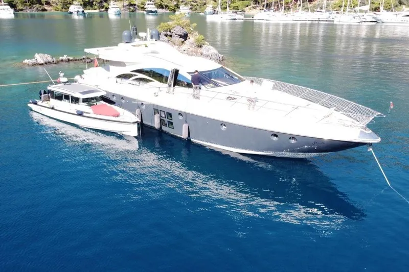  Yacht Photos Pics Luxury 2007 Azimut 86S yacht anchored in serene blue waters.