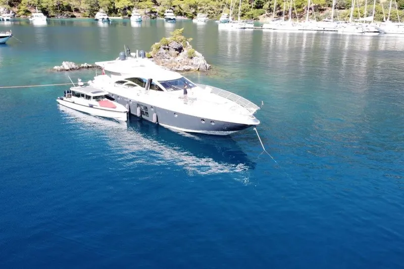  Yacht Photos Pics Luxury Azimut 86S yacht anchored in serene blue waters, 2007 model.