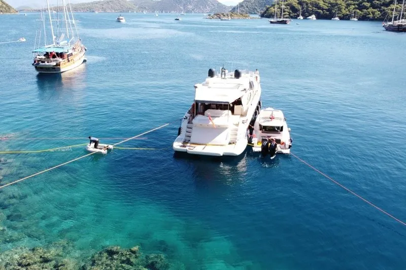  Yacht Photos Pics 2007 Azimut 86S yacht anchored in clear blue waters with nearby boats.