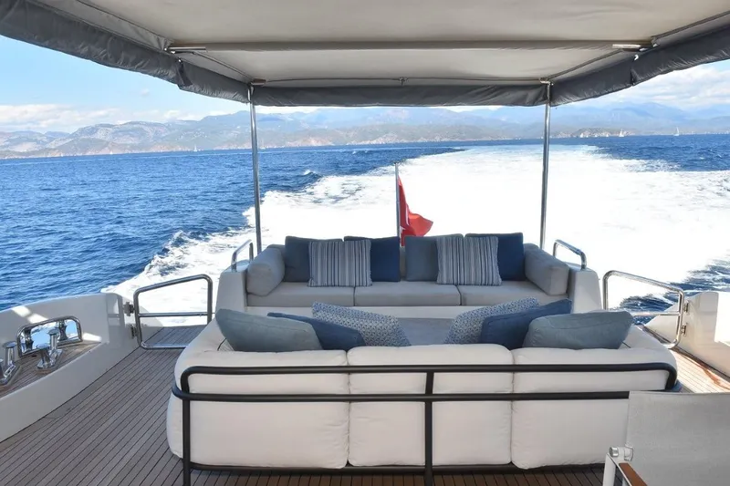  Yacht Photos Pics Luxurious 2007 Azimut 86S yacht deck with comfortable seating, cruising on open sea.