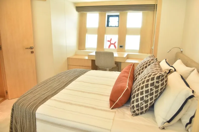  Yacht Photos Pics Luxurious bedroom interior on 2007 Azimut 86S yacht with stylish decor and natural light.