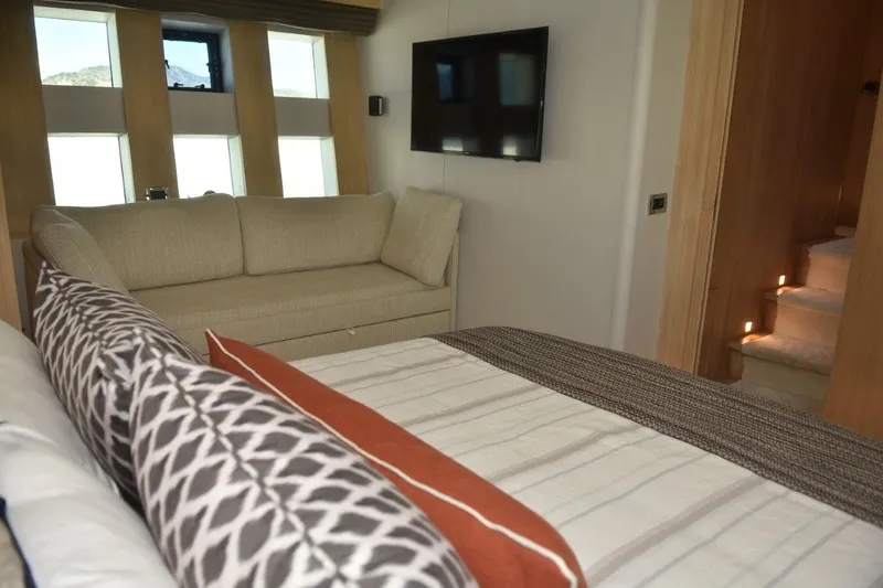  Yacht Photos Pics Luxurious interior of 2007 Azimut 86S yacht with cozy seating and modern decor.