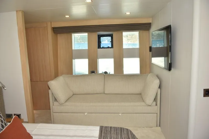  Yacht Photos Pics Luxurious interior of 2007 Azimut 86S yacht with beige sofa and modern decor.