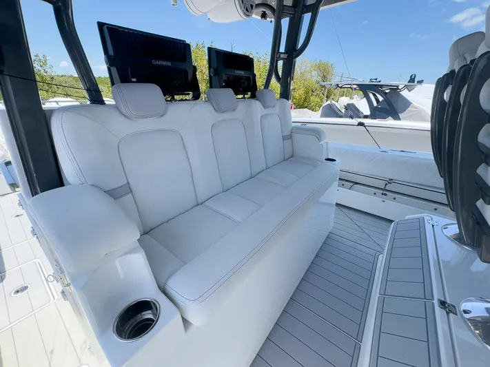  Yacht Photos Pics Luxurious seating on 2019 HCB 53 Sueños boat with sleek white upholstery and modern design.