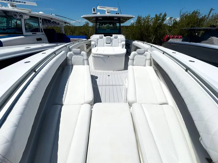  Yacht Photos Pics 2019 HCB 53 Sueños luxury boat with spacious white seating and sleek design.