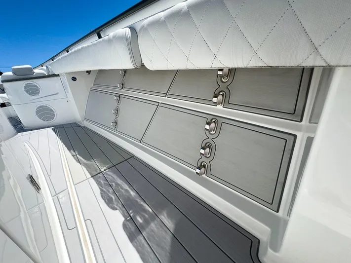  Yacht Photos Pics Luxury interior of 2019 HCB 53 Sueños boat with sleek storage compartments.