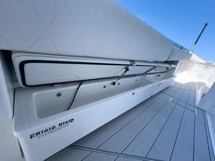  Yacht Photos Pics 2019 HCB 53 Sueños boat with Frigid Rigid storage, open compartment view.