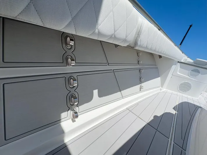  Yacht Photos Pics 2019 HCB 53 Sueños boat interior with sleek storage compartments and quilted upholstery.