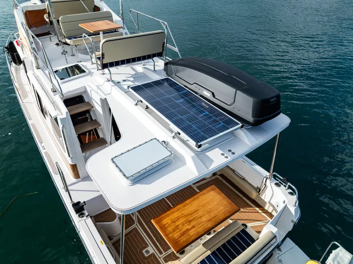Toujours Yacht Photos Pics 2021 Ranger Tugs R-31 CB boat with solar panel and seating on deck.