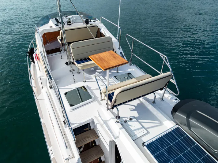 Toujours Yacht Photos Pics 2021 Ranger Tugs R-31 CB boat with upper deck seating and solar panel.