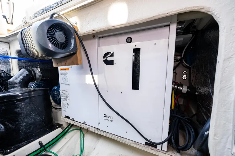 Toujours Yacht Photos Pics 2021 Ranger Tugs R-31 CB engine compartment with Onan generator and fan.