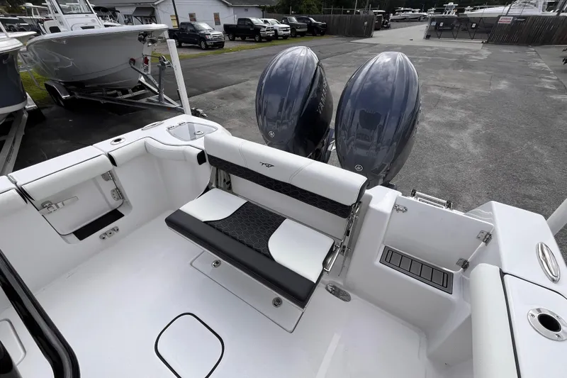  Yacht Photos Pics 2026 Tidewater 256 CC Adventure boat with dual engines and sleek seating design.