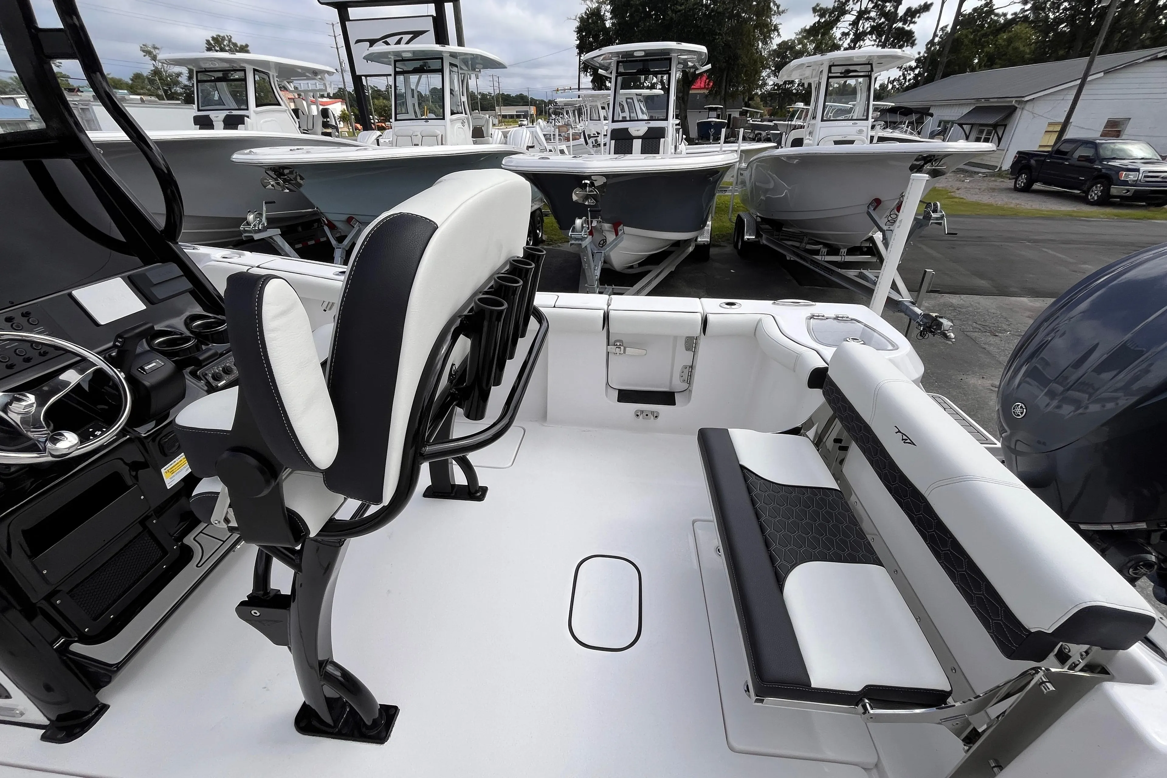 2026 Tidewater 256 CC Adventure boat interior with seating and control panel.
