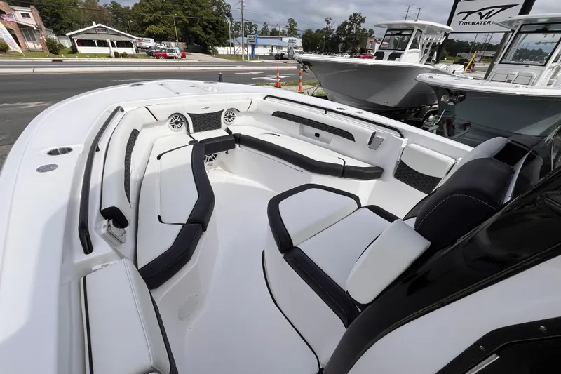  Yacht Photos Pics 2026 Tidewater 256 CC Adventure boat interior with sleek seating and modern design.