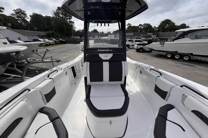  Yacht Photos Pics 2026 Tidewater 256 CC Adventure boat interior with sleek seating and modern design.