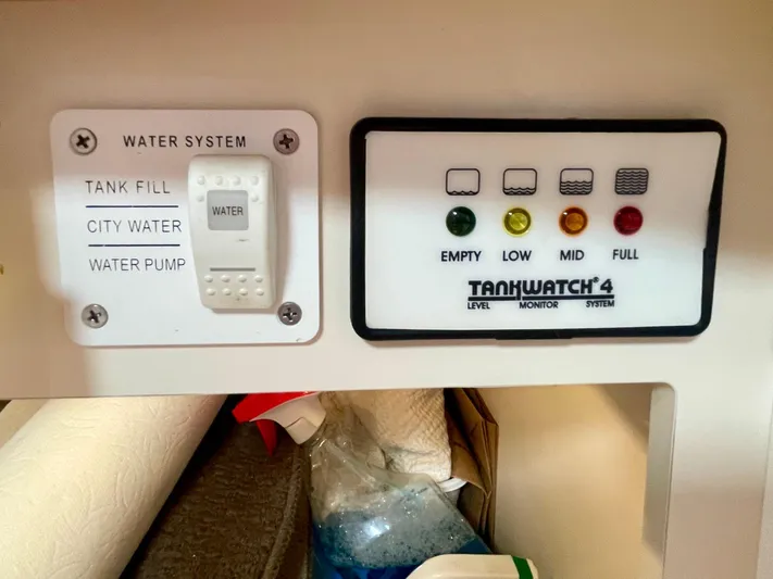 Aloha Spirit Yacht Photos Pics Control panel for water system and tank level monitor in a 2003 Formula 40 PC.