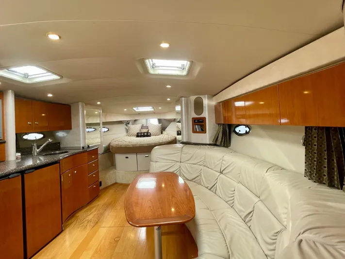 Aloha Spirit Yacht Photos Pics Luxurious interior of a 2003 Formula 40 PC yacht with modern amenities and elegant design.