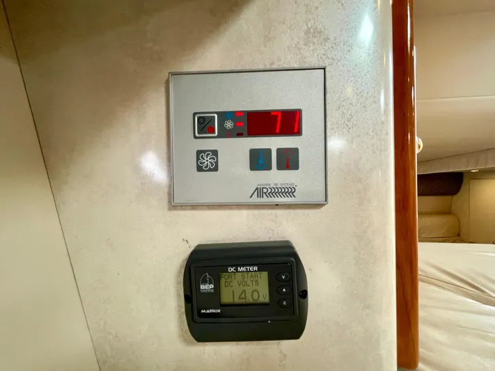 Aloha Spirit Yacht Photos Pics Control panel and DC meter on 2003 Formula 40 PC yacht interior.
