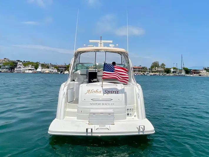 Aloha Spirit Yacht Photos Pics 2003 Formula 40 PC yacht "Aloha Spirit" with American flag, Newport Beach, CA.