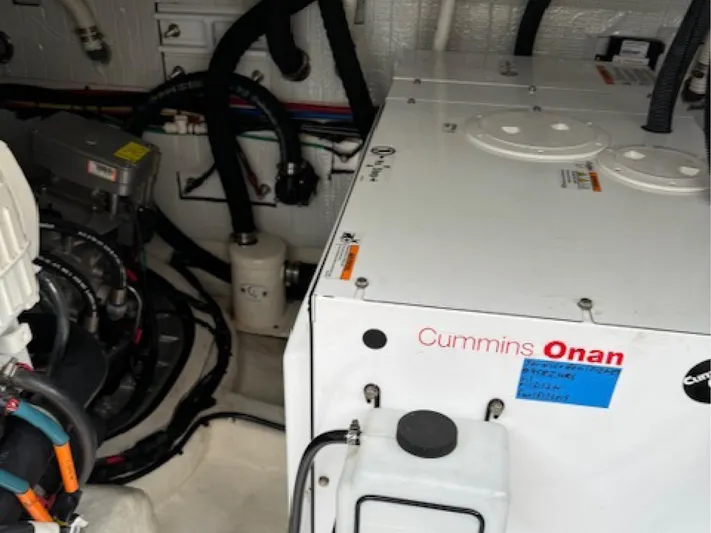 Andante III Yacht Photos Pics Engine room of 2017 Sabre 45 Salon Express with Cummins Onan generator.