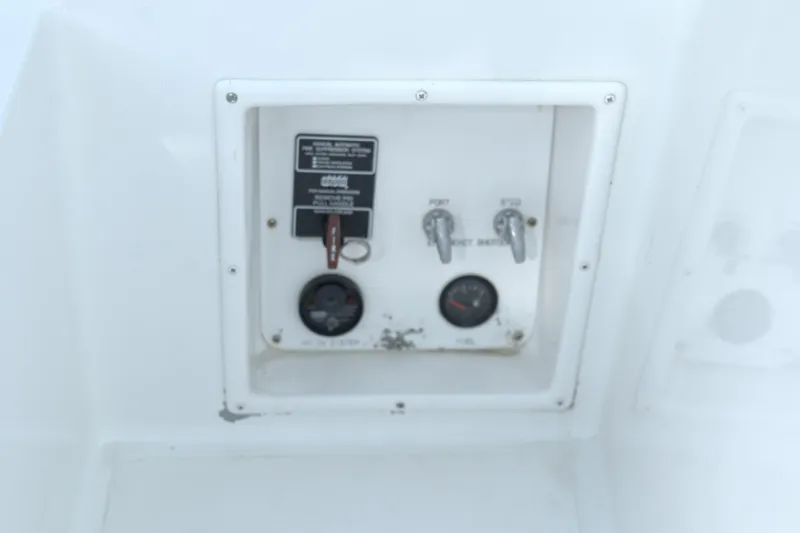 Blueprint Yacht Photos Pics Control panel on a 2002 Viking 43 Open boat, featuring switches and gauges.