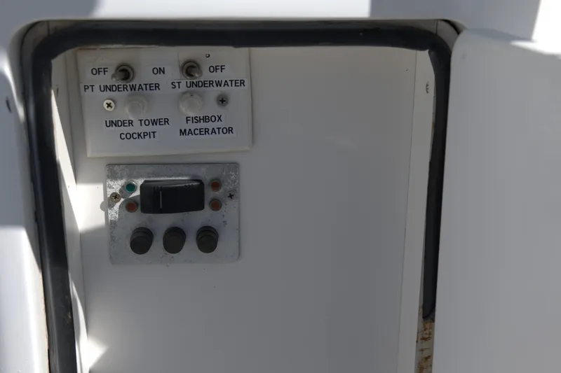 Blueprint Yacht Photos Pics Control panel on a 2002 Viking 43 Open boat with switches and buttons.