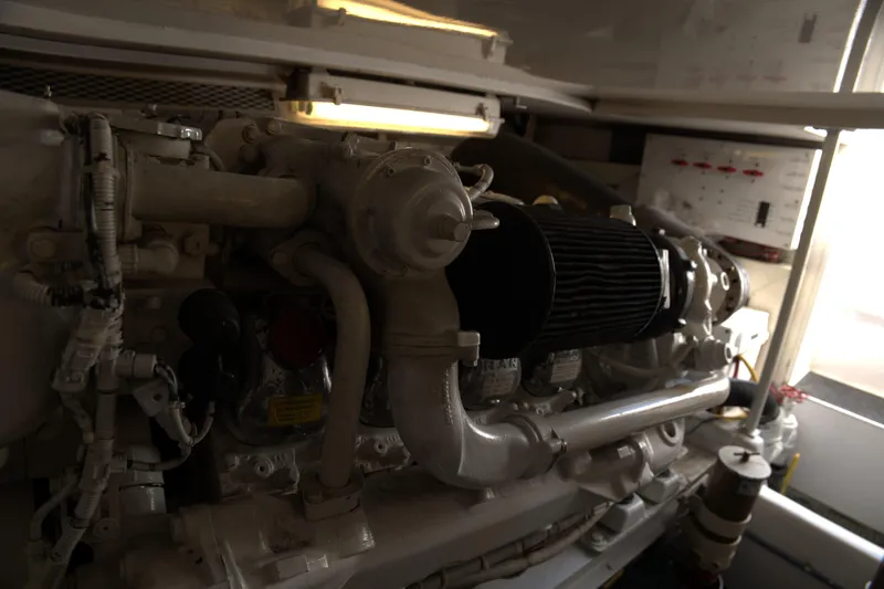Blueprint Yacht Photos Pics Engine room of a 2002 Viking 43 Open yacht, showcasing mechanical components.