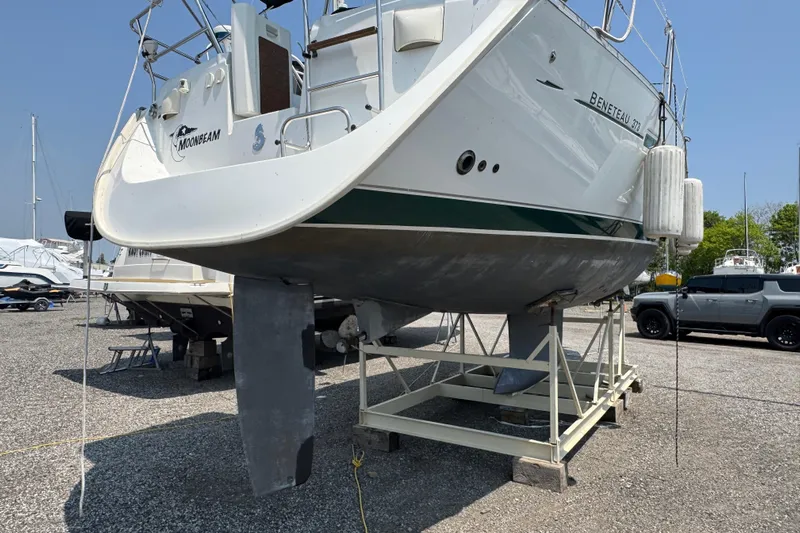  Yacht Photos Pics 2007 Beneteau Oceanis Clipper 373 sailboat on dry dock, side view.