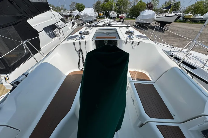  Yacht Photos Pics 2007 Beneteau Oceanis Clipper 373 sailboat cockpit with seating and covered helm.