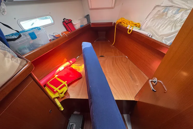  Yacht Photos Pics Interior cabin of 2007 Beneteau Oceanis Clipper 373 with storage and safety equipment.
