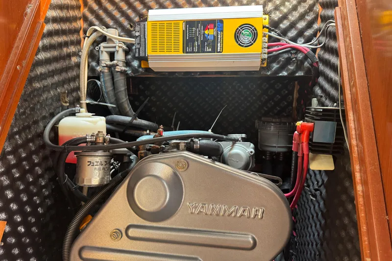  Yacht Photos Pics Engine compartment of 2007 Beneteau Oceanis Clipper 373 with Yanmar engine and electrical components.