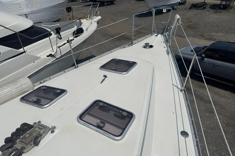  Yacht Photos Pics 2007 Beneteau Oceanis Clipper 373 sailboat deck with hatches and railing.