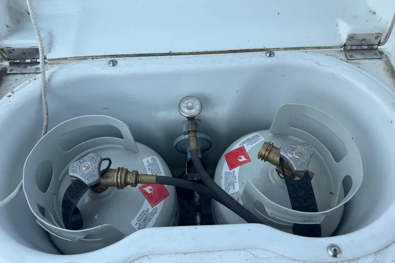  Yacht Photos Pics Propane tanks in storage compartment of 2007 Beneteau Oceanis Clipper 373 sailboat.