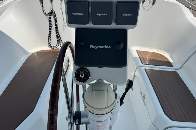  Yacht Photos Pics Cockpit of 2007 Beneteau Oceanis Clipper 373 with Raymarine navigation equipment.