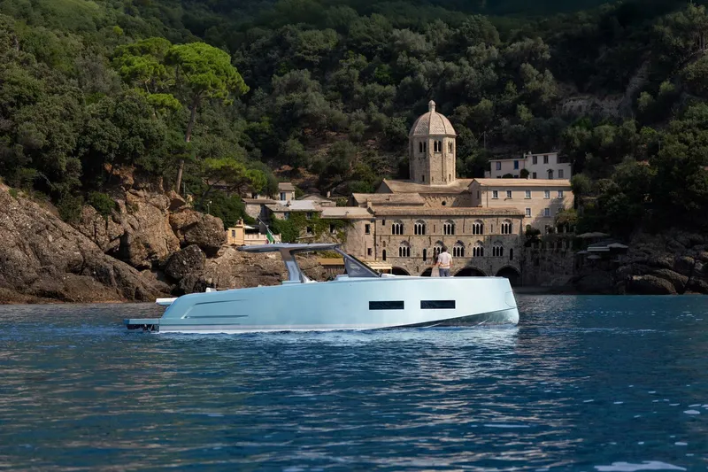  Yacht Photos Pics 2026 Pardo Yachts P43 cruising near historic coastal architecture.