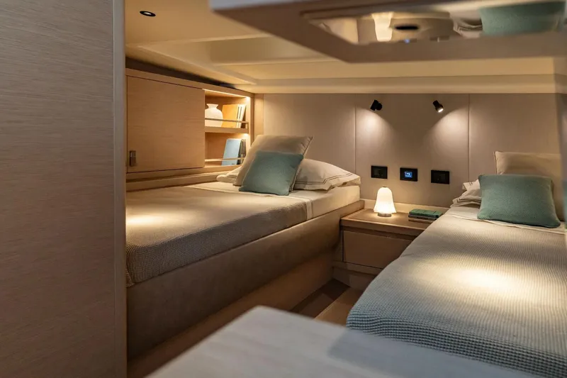  Yacht Photos Pics Luxurious cabin interior of 2026 Pardo Yachts P43 with twin beds and modern lighting.
