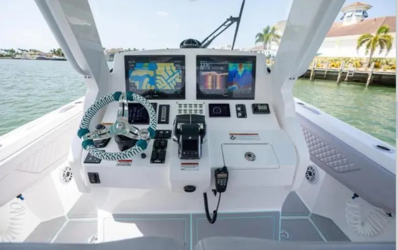  Yacht Photos Pics 2023 Intrepid 375 boat dashboard with advanced navigation and control systems.