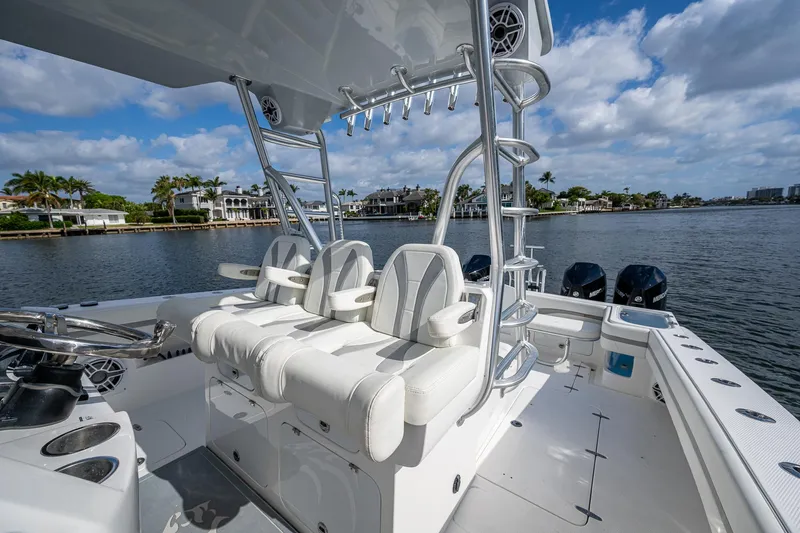  Yacht Photos Pics 2023 Prowler Renaissance 36 boat interior with white seating and water view.