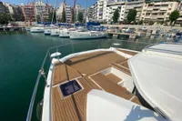 2020 Leopard 43 Powercat docked in a marina with cityscape background.