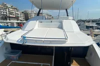2020 Leopard 43 Powercat yacht docked in marina, showcasing spacious deck and modern design.