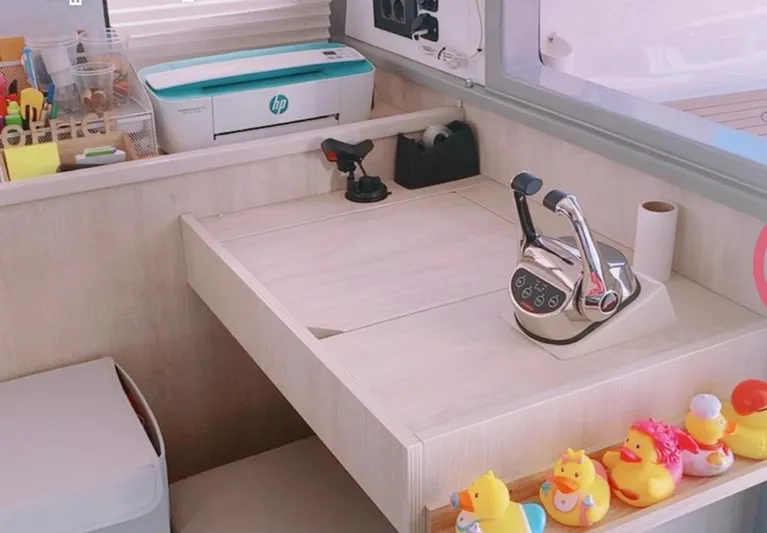  Yacht Photos Pics Control panel on 2020 Leopard 43 Powercat with rubber ducks and printer.