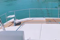 Leopard 43 Powercat 2020 yacht deck with serene blue water background.