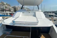 2020 Leopard 43 Powercat yacht with spacious deck and modern design in marina setting.