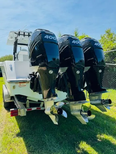  Yacht Photos Pics 2022 Invincible 36 Open Fisherman with triple 400 horsepower engines on a trailer.