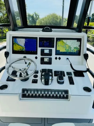  Yacht Photos Pics 2022 Invincible 36 Open Fisherman boat dashboard with advanced navigation and control systems.