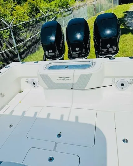  Yacht Photos Pics 2022 Invincible 36 Open Fisherman boat with triple outboard engines.