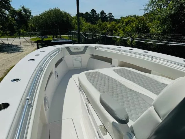  Yacht Photos Pics 2022 Invincible 36 Open Fisherman boat with spacious seating and sleek design.