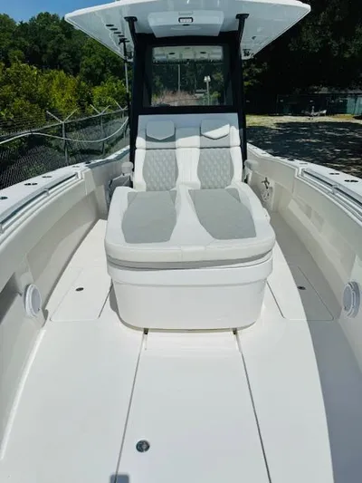  Yacht Photos Pics 2022 Invincible 36 Open Fisherman boat with spacious seating and sleek design.