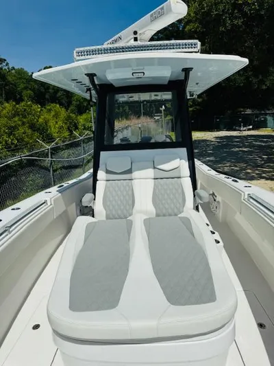  Yacht Photos Pics 2022 Invincible 36 Open Fisherman boat with sleek seating and modern design.