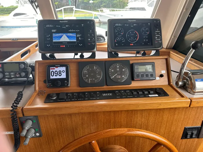 River Miss Yacht Photos Pics 1997 Mainship 350 helm with navigation instruments and controls.